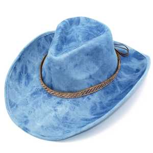Close-up of blue tie-dye denim cowboy hat with sparkling rhinestone band and dark chin strap