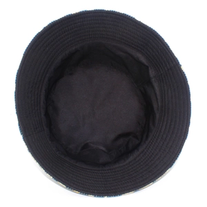 Detail view of the interior construction and reinforced stitched brim of the black bucket hat