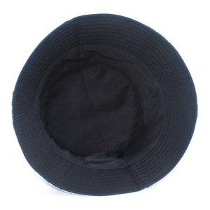 Detailed internal view showing tidy stitching and crown structure of the black bucket hat