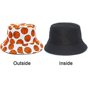 Detailed side-by-side view of the reversible basketball print sun hat in black and white
