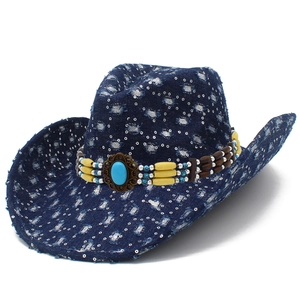 Vintage dark blue denim cowboy hat with distressed holes, sequins, and turquoise beads