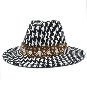 Classic houndstooth jazz fedora hat with brown leather belt and heart metal rivets