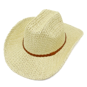 Detail showing hollow weave texture and brown leather decorative band on the cowboy hat