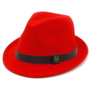 Classic bright red felt fedora hat with a brown leather band and golden M emblem