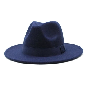Detailed close-up of navy blue wool fedora hat with matching grosgrain ribbon band
