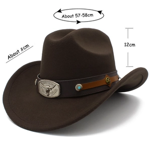 Detail of western cowboy hat with silver bull head emblem and turquoise metal studs