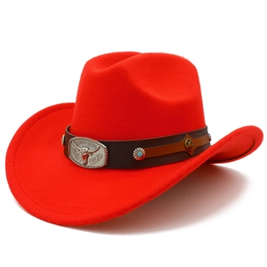 Detailed close-up of a red felt cowboy hat featuring a leather band and bull skull buckle