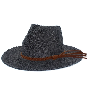 Elegant wide brim straw sun hat with breathable hollow weave and braided tassel band