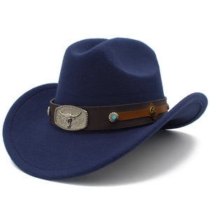 Detail of navy blue felt cowboy hat with leather band and decorative metal bull head stud