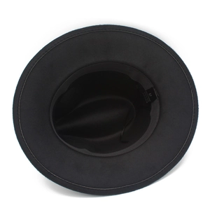 Inside view of a stylish black wide brim wool jazz hat with inner lining and size label