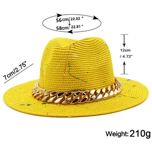 Size chart for yellow straw fedora with acrylic chain and paint splatter detail
