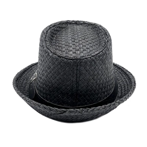 Detail of black woven straw fedora showing fine mesh texture and satin ribbon with buckle