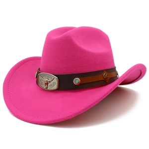 Detail of rose pink western cowboy hat featuring bull head metal buckle and turquoise studs