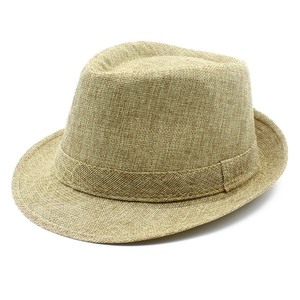 Detailed view of high-density straw fedora texture and woven band detail