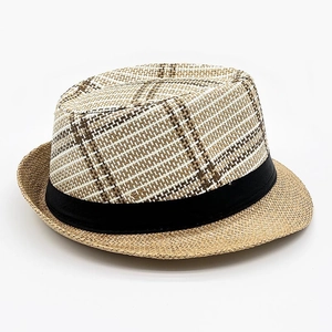 Detailed close-up of woven fedora hat with plaid pattern and black decorative ribbon