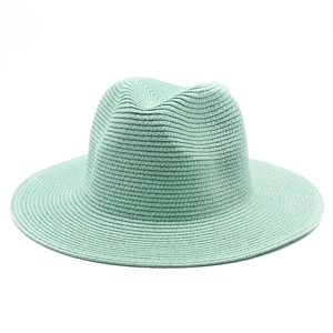 Detailed view of the fine mint green weave and texture on a summer panama sun hat