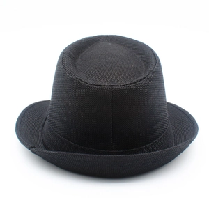 Detailed macro view of the breathable black woven mesh fabric and curled brim of the fedora hat