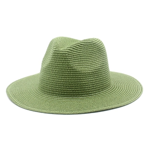 Detail showing high-quality straw weave texture on a green Panama sun hat for women