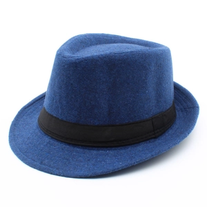 Detail view of the blue wool felt fedora featuring a classic black grosgrain ribbon band