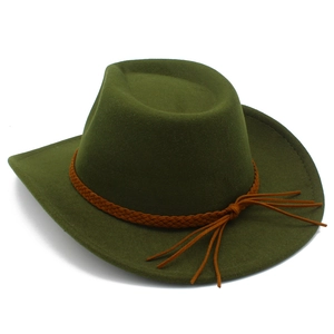 Detail of olive green felt cowboy hat with brown braided band and tassel decor