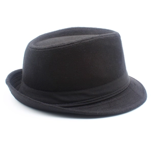Detailed close-up of a classic black wool fedora with a matching grosgrain ribbon band