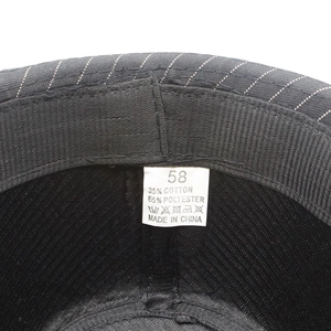 Detail view of inner sweatband and size label for the black striped gentleman jazz hat