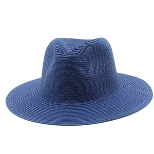 Top view of a dark blue Panama straw hat with a dense weave texture for sun protection