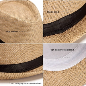 Dettaglio cappello di paglia fedora con trama di alta qualità e nastro decorativo nero