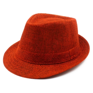 Close-up of the woven texture and matching belt on an orange linen fedora hat