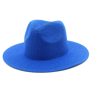 Detailed close-up showing the uniform woven texture of the royal blue straw fedora hat