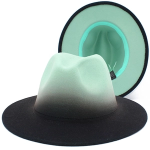 Detailed view of mint green to black gradient wool felt fedora with flat wide brim