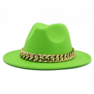 Detailed view of neon green fedora hat featuring a chunky gold chain band ornament