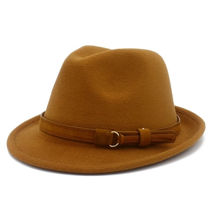 Close-up of caramel wool fedora hat featuring a stylish belt with gold metal buckle