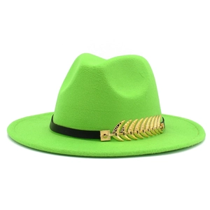 Detailed view of neon green wool fedora with black band and gold leaf buckle accent