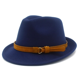 Detailed close-up of dark blue wool fedora hat featuring a brown belt and gold buckle