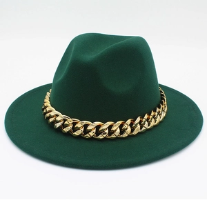 Detail of dark green wool fedora with a polished chunky gold metal chain link band