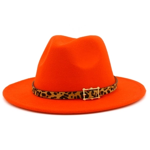 Detail view of orange wool fedora hat featuring leopard print band and golden metal buckle