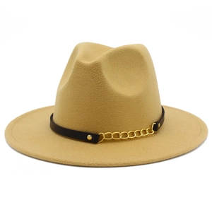 Close-up of khaki fedora hat featuring black leather band and gold metal chain detail