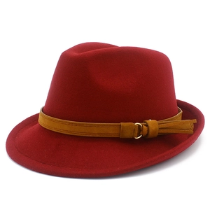 Classic burgundy wool fedora hat with brown leather belt and golden metal buckle for winter