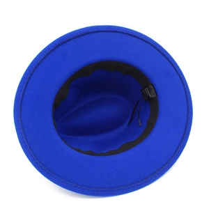 Detail of blue fedora hat interior showing black sweatband and adjustable string