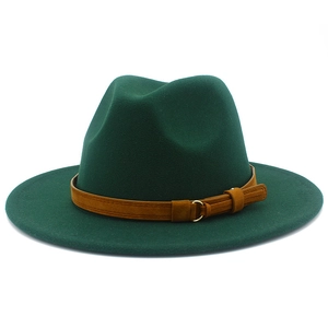 Detailed view of dark green wool fedora with brown suede belt and gold buckle