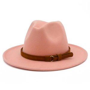 Detail view of pink wool fedora hat with brown faux leather belt and gold buckle