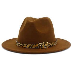 Detail showing the leopard print band and golden buckle on this brown felt fedora hat