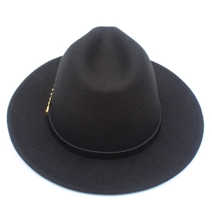Classic black wool fedora hat with elegant gold metal accent on a ribbon band
