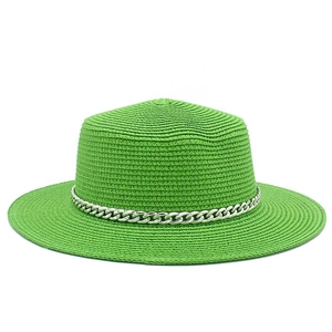 Close-up of vibrant green straw boater hat with a stylish silver chain band decoration