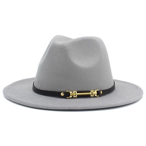 Detail of the gray fedora hat featuring a black leather band and gold metal buckle