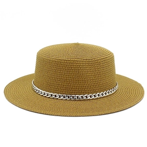 Close-up of woven straw hat featuring a stylish silver metal chain around the brim
