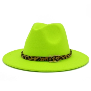 Macro detail of the leopard print belt with a gold buckle on the neon green wool fedora hat