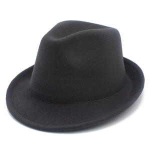 Detail of classic black wool fedora with sturdy stitching and premium felt texture