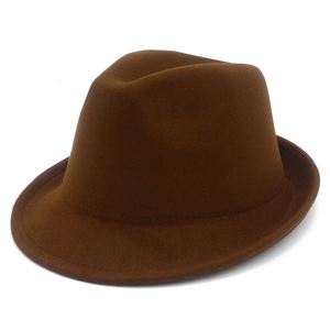 Close-up of deep brown wool fedora hat crown with classic three-way indentation and stitching